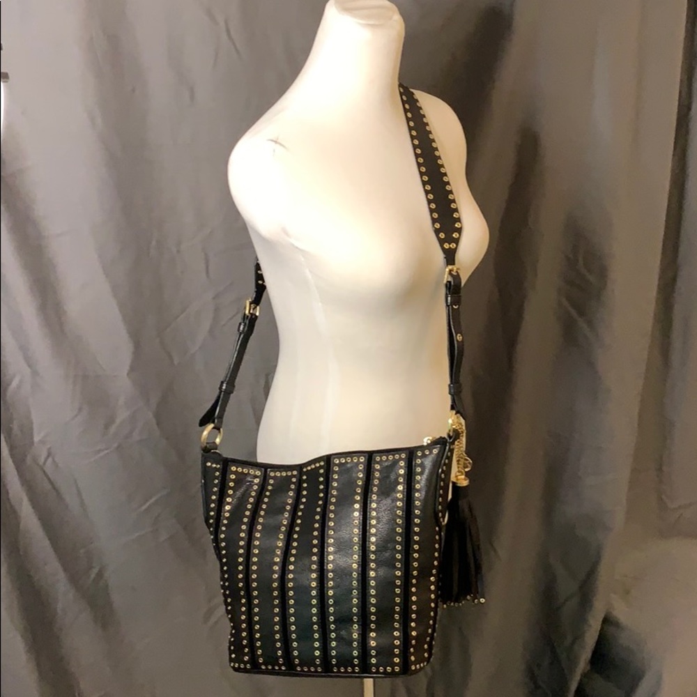 Michael KORS black Grommet Satchel.